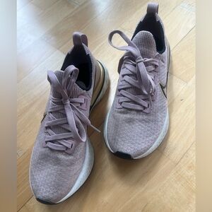 Women's Nike React Infinity Running Sneakers in Light Purple and gold
